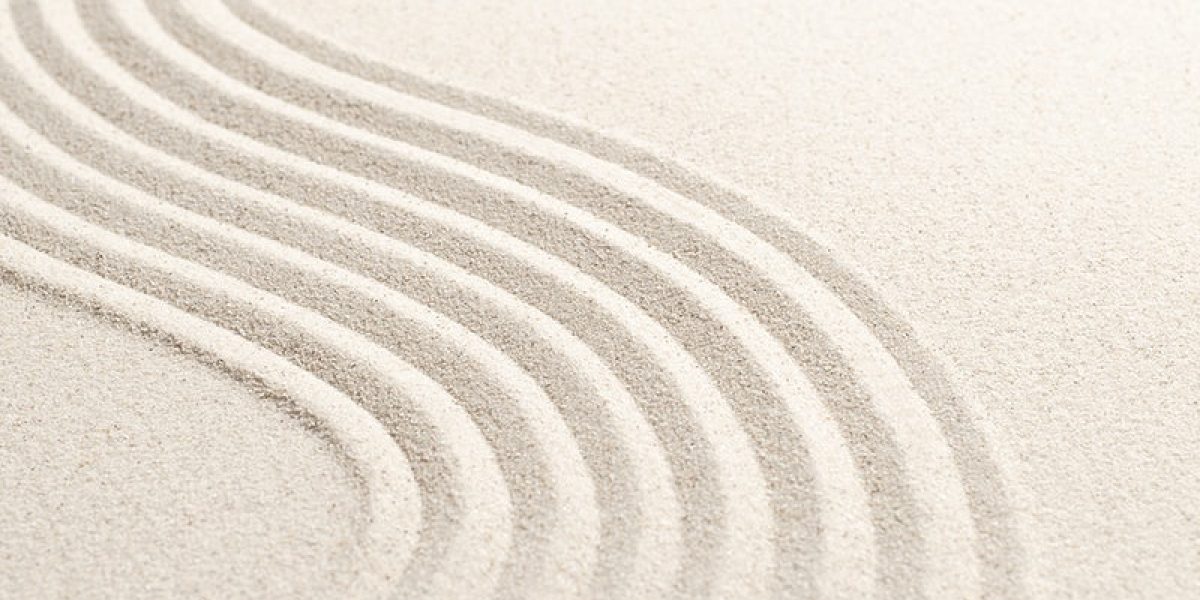 Sand wave nature textured background in wellness concept